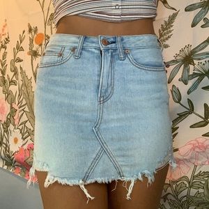 Light wash denim skirt.